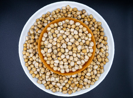 Beautiful organic dried chickpea beans consisting of raw Bengal legume pea. Dry egyptian legume pea seeds this is tasty food ingredient of chickpea beans. Edible healthy chickpea beans in legume peaの写真素材