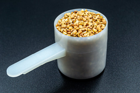 Beautiful organic dry buckwheat grains consisting of raw natural product. Dry buckwheat grains this...