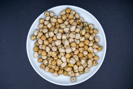 Beautiful organic dried chickpea beans consisting of raw Bengal legume pea. Dry egyptian legume pea...