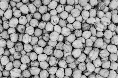 Beautiful organic dried chickpea beans consisting of raw Bengal legume pea. Dry egyptian legume pea...