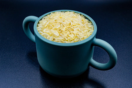 Many delicious summer rice grain on grocery market counter, tasty organic food consisting of fresh...