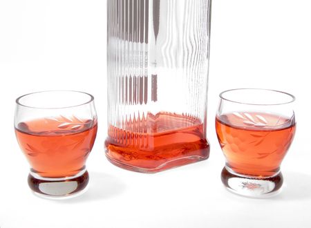 Bottle with alcohol and wine-glasses の写真素材