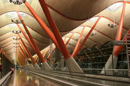 Modern interiors of Madrid Barajas Airport Terminal 4 in the eveningのeditorial素材