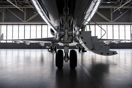 Luxury private jet plane in aviation hangar