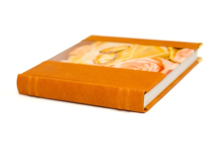 Wedding album with the gold corners on a white backgroundの写真素材