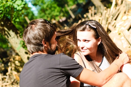 Young happy couple on the field. Shoot on the nature.の写真素材