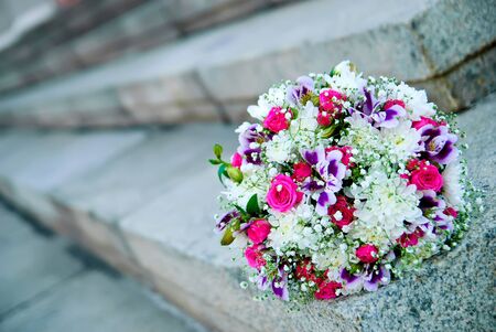 Bridal bouquet on the stone stairsの写真素材