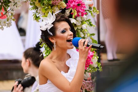 DONETSK, UKRAINE - MAY 15: Annual wedding parade. Bride parade participants in wedding gowns poses during the "Bride Parade" in Donetsk - May 15, 2011 in Donetsk, Ukraine.のeditorial素材