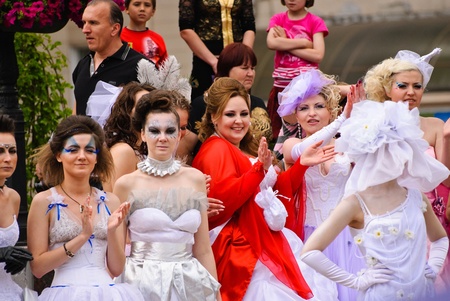 DONETSK, UKRAINE - MAY 15: Annual wedding parade. Bride parade participants in wedding gowns poses during the "Bride Parade" in Donetsk - May 15, 2011 in Donetsk, Ukraine.のeditorial素材
