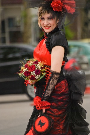 DONETSK, UKRAINE - MAY 15: Annual wedding parade. Bride parade participants in wedding gowns poses during the "Bride Parade" in Donetsk - May 15, 2011 in Donetsk, Ukraine.のeditorial素材