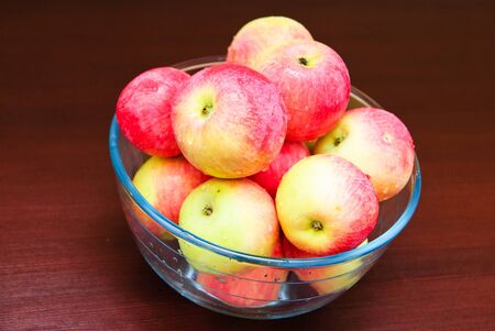 Bowl filled with applesの写真素材
