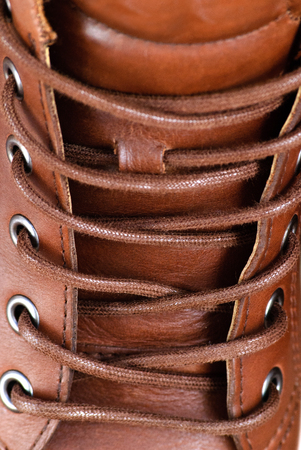 Brown sport shoes with laces. Close up view.の写真素材