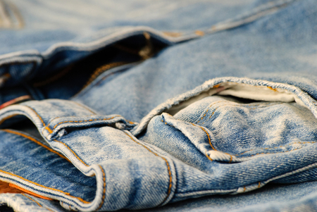 Old blue denim jeans. Close up view.の写真素材