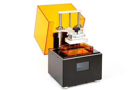 Small home 3D printer on a white background. Studio shot.の写真素材