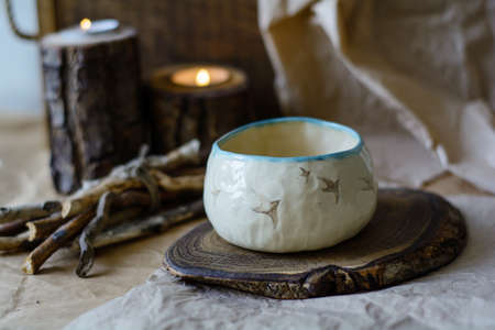 Photography of the authentic handmade ceramic craftware in a cozy home interior. Bowl.の写真素材