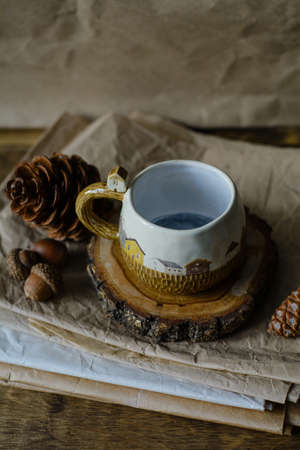 Photography of the authentic handmade ceramic craftware in a cozy home interior. Cup.の写真素材