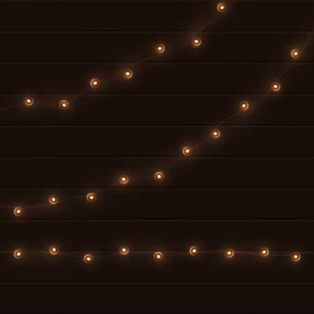 Vector vintage light garland on brown wooden background.のイラスト素材