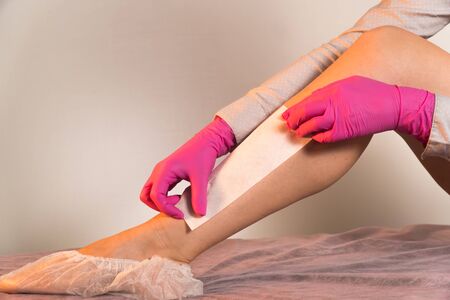 wax strips leg to remove unwanted hair mediumの写真素材