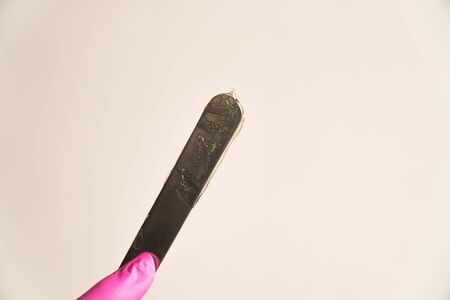 metal spatula in the rest of the pasteの写真素材