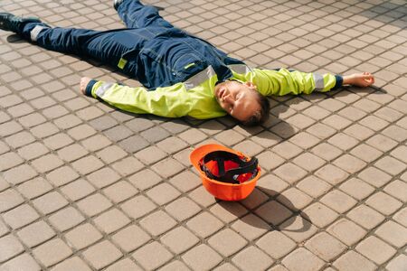 industrial accident. the man died while working at a construction site. workplace safety concept. general plan, top viewの写真素材