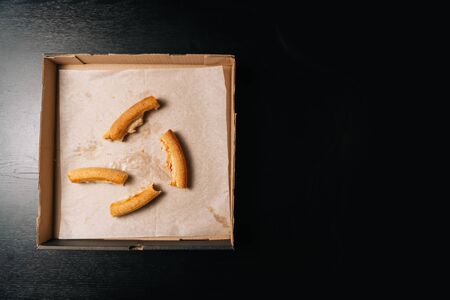 The crusts are leftovers from the pizza in the box. The concept of finishing a meal. Fast food delivery.の写真素材
