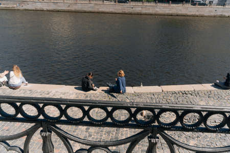 People in medical masks walk around the city. The concept of a bad social diet.June 8, 2020 Saint-Petersburg, Russiaのeditorial素材