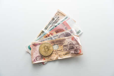Banknotes of different countries of the world close-up on the tableの写真素材