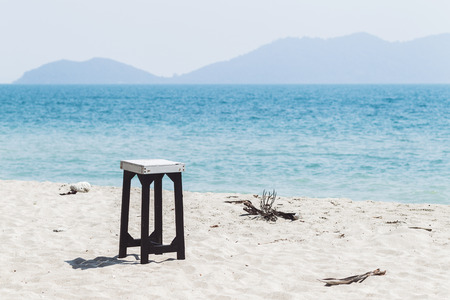 Beach furniture on white sandの写真素材