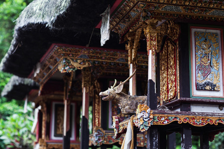Wooden statuette of the deity in a Balinese templeの写真素材