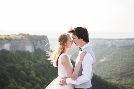 Wedding photo shoot in the mountains with stunning viewsの写真素材