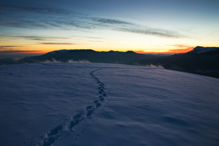 Tracks in the snow in the mountainsの写真素材