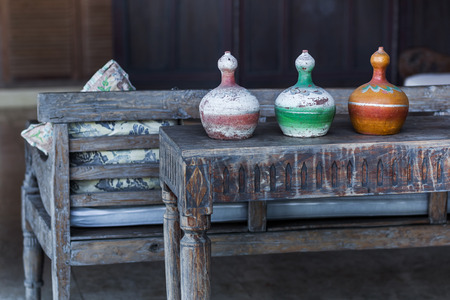 Three decorative vases mexican style on wooden vintage tableの写真素材