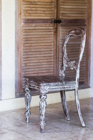 Shabby vintage handmade wooden chair. Wood carvingの写真素材