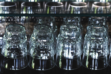 Set of glasses in the bar on a dark backgroundの写真素材