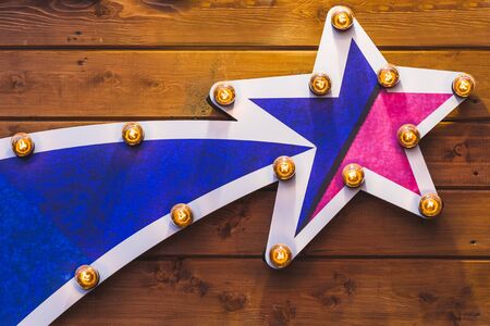 Comet stars illuminated light bulbs as a decoration for New Yearの写真素材