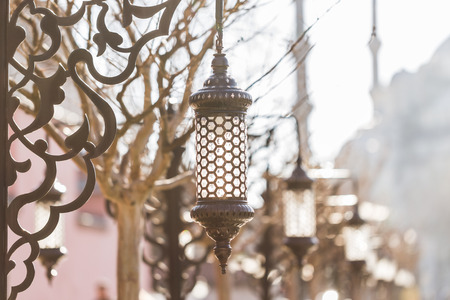 Many beautiful old vintage metal lantern on a square near the Blue Mosque in Istanbul. Forging metal...