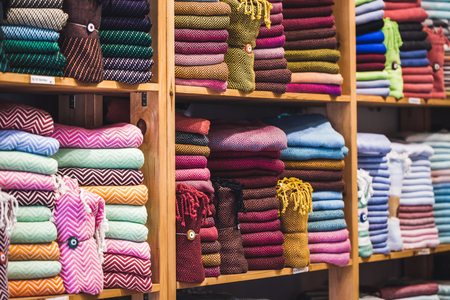 Store tissue. Big shelf with a colorful towelsの写真素材