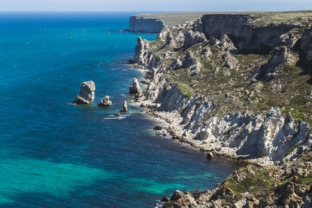 Coast Dzhangul in Crimea. Idyllic paradise landscape with crystal clear water and cliff beachの写真素材