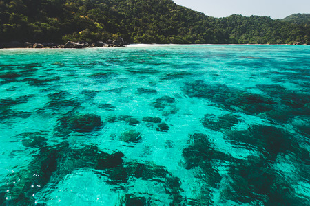 Sea bay with clear emerald water. Paradise  holidays on islands, snorkelling and diving