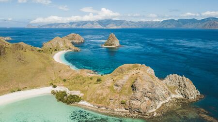 Aerial panoramic view of Padar island in Komodo National Park, Indonesia. Drone shot, top view....