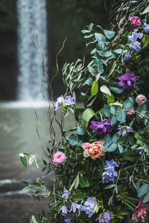 Blooming bouquet of colorful flowers in the nature. Festive concept. Vertical photo.の写真素材