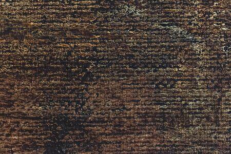 Dark brown canvas texture close up. Empty background