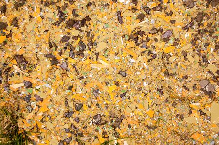 broken off pieces of paint lying on the surface in a jazzy messの写真素材
