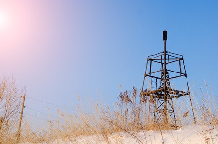 metallic geodesic sign on a background of a blue sky in winterの写真素材