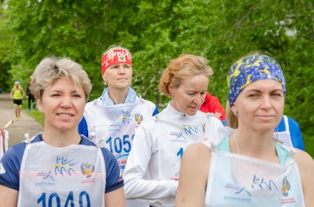 Komsomolsk-on-Amur, RUSSIA - JUNE 2, 2019. Running competitions among elderly sports veterans. women before start in the competition for running among older athletesのeditorial素材