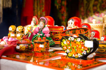 Komsomols-on-Amur, Russia - September 30, 2017. Russian home-made various souvenirs on sale at a city fair. nesting dolls and containersのeditorial素材