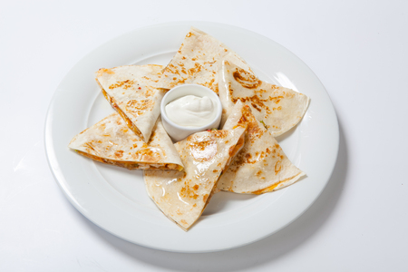 original mexican quesadilla with chicken and vegetables.の写真素材