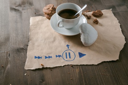 white coffee cup and gingerbread and cookie on wooden desk.の写真素材