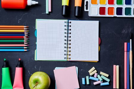 Back to school or student and education concept. Top view. School notebook and and accessories for...
