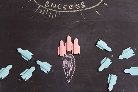 Unity and teamwork concept. Rocket team leads the competitionの写真素材